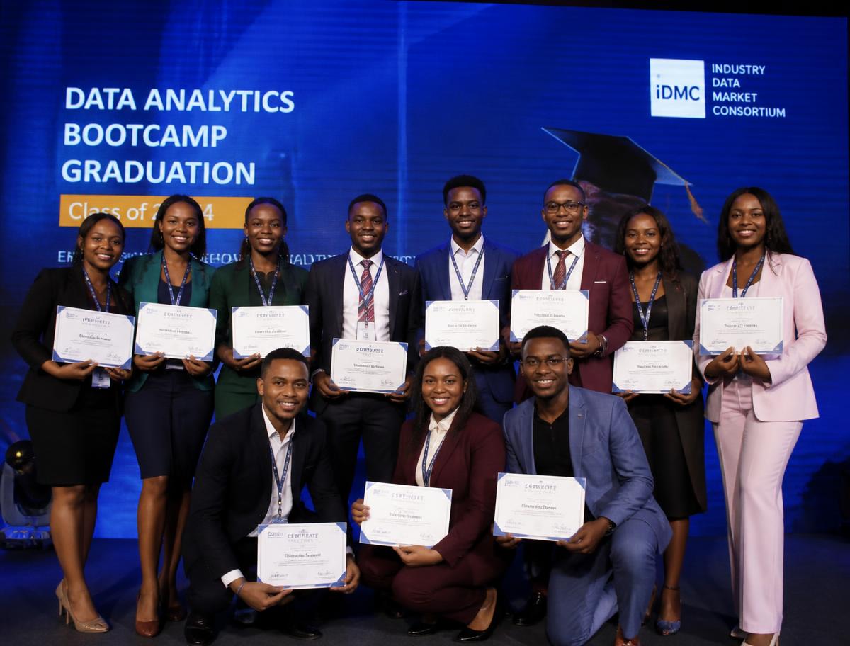 Data analytics bootcamp graduates holding their certificates